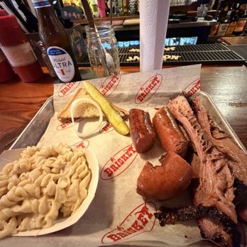 Brisket  - A great few slices of brisket, a dinky, pickle and onion and piece of bread, bad kielbasa, and horrendous mac & cheese. - Barbeque Near Me - North Myrtle Beach, South Carolina