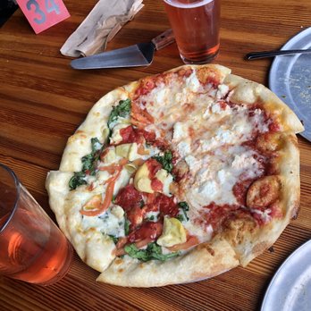Sizzle Pie - Half and Half small pizza with the four horseman and the slaughter of the soil with their draft cider - Pizza Near Me - Portland, Oregon Sizzle Pie - Half and Half small pizza with the four horseman and the slaughter of the soil with their draft cider - Pizza Near Me - Portland, Oregon
