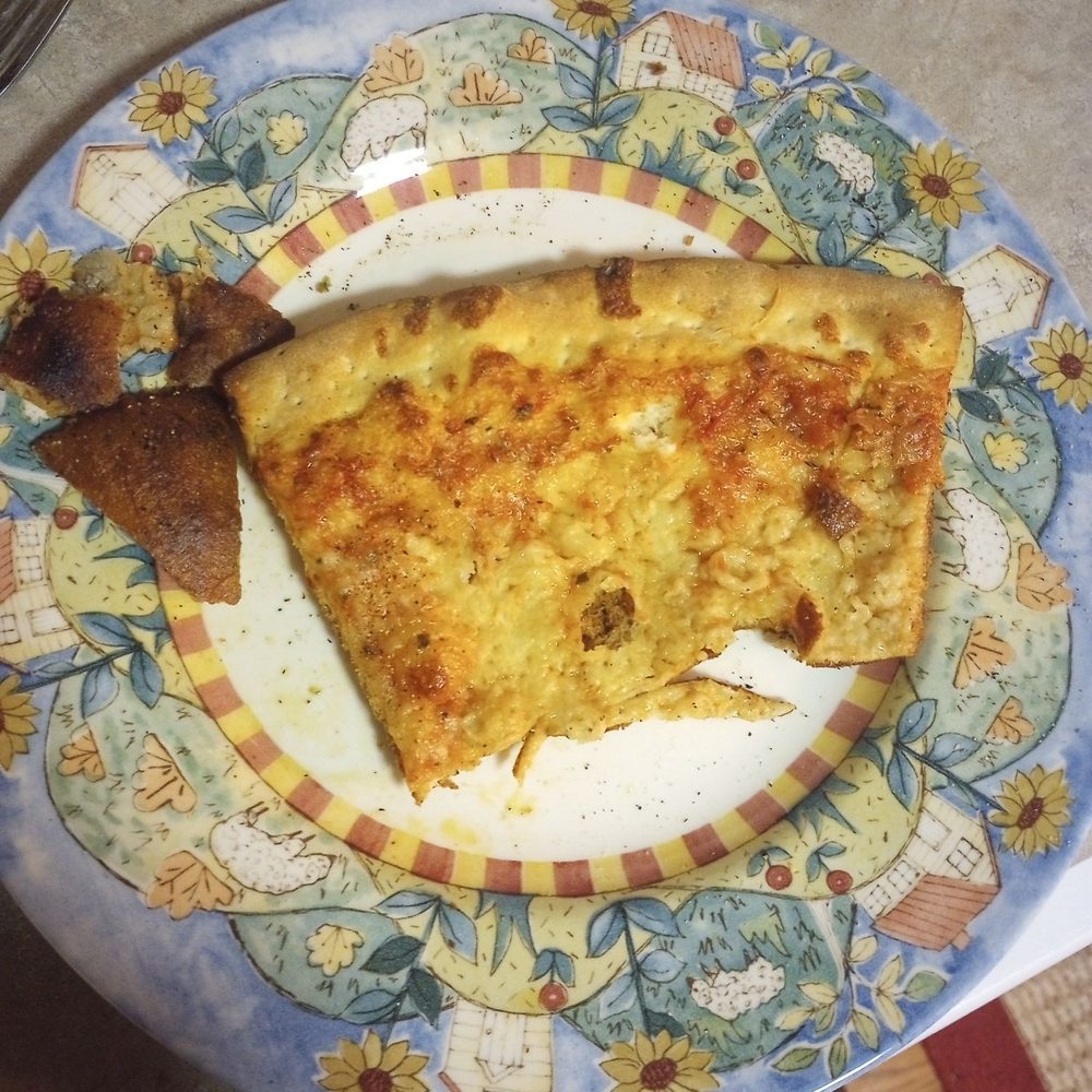 Ruffrano's Hell's Kitchen Pizza - Top of pizza. - Pizza Near Me - Colorado Springs, Colorado Ruffrano's Hell's Kitchen Pizza - Top of pizza. - Pizza Near Me - Colorado Springs, Colorado