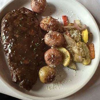 Cynthia's Ristorante - Ribeye with a special sauce, red new potatoes, and a vegetable melody - Italian Near Me - Paducah, Kentucky Cynthia's Ristorante - Ribeye with a special sauce, red new potatoes, and a vegetable melody - Italian Near Me - Paducah, Kentucky