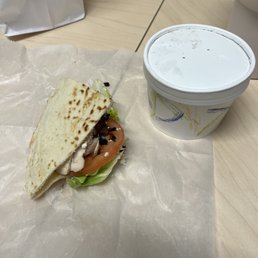 a sandwich and a cup of coffee a sandwich and a cup of coffee