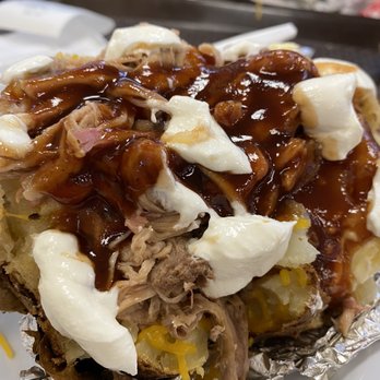 Whitt's Barbecue - Finished product in combination with barbecue sauce, mild vinegar, and sour cream - Barbeque Near Me - Nashville, Tennessee Whitt's Barbecue - Finished product in combination with barbecue sauce, mild vinegar, and sour cream - Barbeque Near Me - Nashville, Tennessee