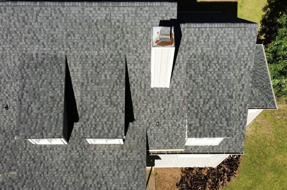 Slide of Chris Moore Roofing