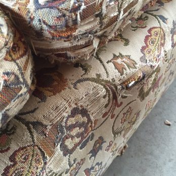 Upholstery on Broadway - Before: springs sticking out, fabric in bad shape - Furniture Reupholstery Near Me - Arlington, Massachusetts
