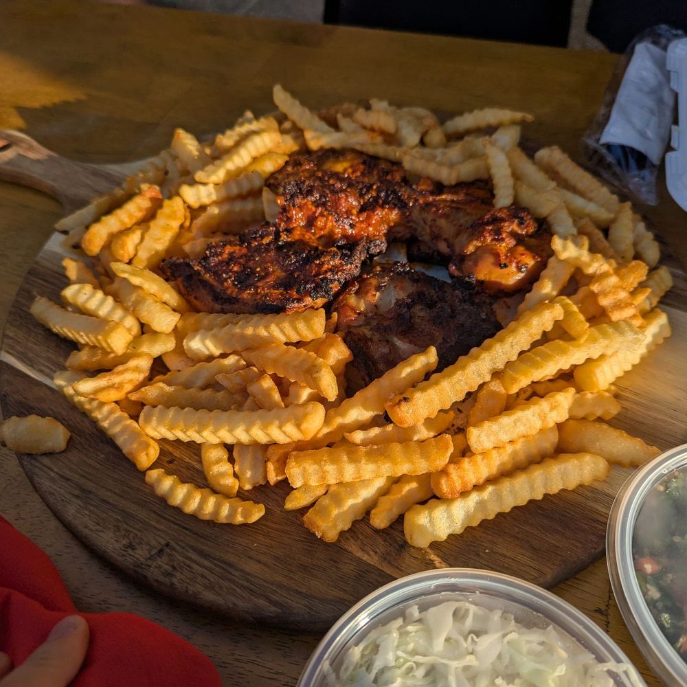 Skewer - Whole grilled chicken with fries. - Lebanese Near Me - Los Angeles, California Skewer - Whole grilled chicken with fries. - Lebanese Near Me - Los Angeles, California