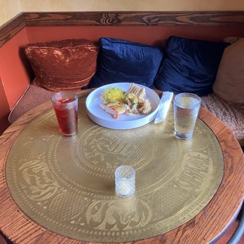 Jerusalem Garden Cafe - Corner booth with Salmon plate, hibiscus tea - Middle Eastern Near Me - Asheville, North Carolina Jerusalem Garden Cafe - Corner booth with Salmon plate, hibiscus tea - Middle Eastern Near Me - Asheville, North Carolina