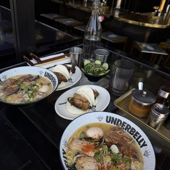 Underbelly - left ramen: Belly of the Beast Ramen right ramen: Underbelly Ramen sides: 2 pork belly & 2 short rib bal bun as well as a seaweed salad - Bars Near Me - San Diego, California Underbelly - left ramen: Belly of the Beast Ramen right ramen: Underbelly Ramen sides: 2 pork belly & 2 short rib bal bun as well as a seaweed salad - Bars Near Me - San Diego, California