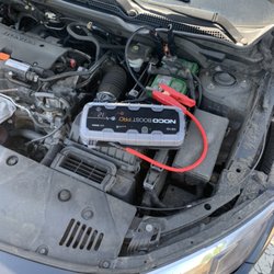 Neighborhood Roadside Assistance - Quick jumpstart on this customers Honda Civic. Give us a call the next time your car battery dies