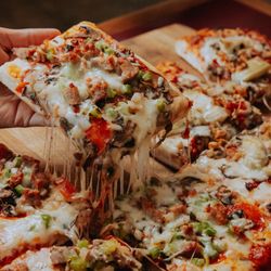 Upper Crust Pizza & Pasta - Original Meat Combo Sicilian square pizza loaded with pepperoni, sausage, mushrooms, onion, and bell peppers