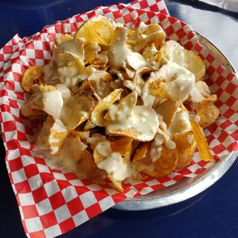 Cootie Brown's - The "Maytag" with drizzled fresh blue cheese draped over homemade spiral fries. Delicious! - Pizza Near Me - Johnson City, Tennessee