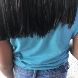 This is how the stylist "fixed" the haircut. Imagine how it looks the first time!