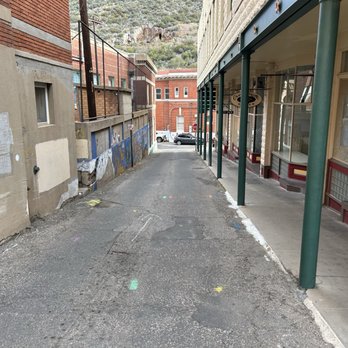 Bisbee Grand Hotel and Bar - Just a small walkway on Main Street with suites that are being renovated to the right ... - New American Near Me - Bisbee, Arizona