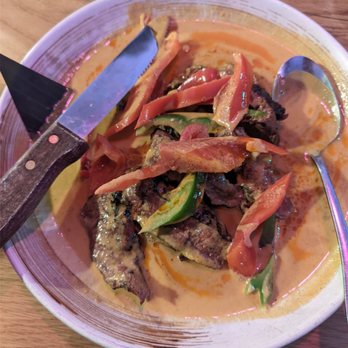 Fern Thai on Main - Panang Neau Yang (Grilled Flat Iron Steak in Panang curry sauce and kaffir lime zest) - Thai Near Me - Bellevue, Washington Fern Thai on Main - Panang Neau Yang (Grilled Flat Iron Steak in Panang curry sauce and kaffir lime zest) - Thai Near Me - Bellevue, Washington