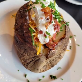 1889 Prime Steak House - Loaded baked potatoes. - Steakhouses Near Me - Olympia, Washington
