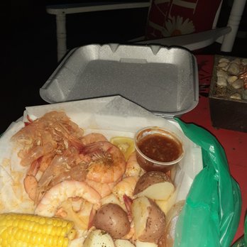 Bubba Gumbo's - Shrimp Dinner with corn and potatoes. I couldnt wait to take it out the bag! I ate on the porch!lol - Seafood Near Me - Tybee Island, Georgia