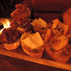 London Wine Bar - Vegetarian toasts (grapes with chevre, pear with brie, grilled peaches with candied walnuts on some other spread)