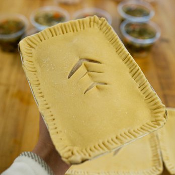 Pasta Patch - a person holding a piece of pie - Pasta Shops Near Me - East Greenwich, Rhode Island Pasta Patch - a person holding a piece of pie - Pasta Shops Near Me - East Greenwich, Rhode Island