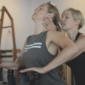 Kinespirit Circle - Hands on assist during a Gyrotonic Tower Class - Pilates Near Me - Portland, Oregon Kinespirit Circle - Hands on assist during a Gyrotonic Tower Class - Pilates Near Me - Portland, Oregon