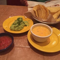 On The Border Mexican Grill & Cantina - Guacamole and cheese dip duo.. Good chips