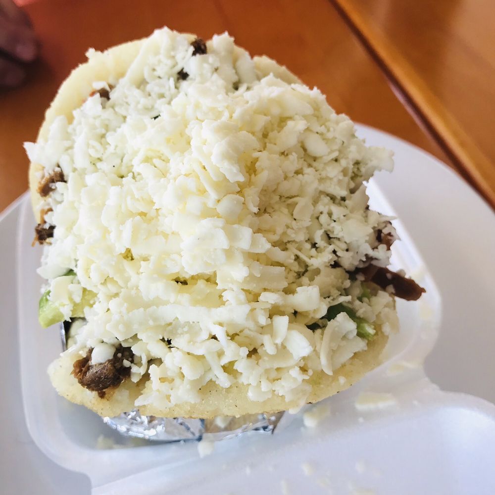 1Chick 1Bro Cafe Bistro - Pabellon arepa - extra cheese lol - Venezuelan Near Me - Gulfport, Florida