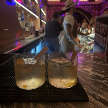 Easy Tiger - LAVISH HABITS Marshmallow Reposado Tequila, Lactic Passionfruit, Passionfruit Liqueur, Prosecco acid w/ Passionfruit caviar - Lounges Near Me - St. Petersburg, Florida