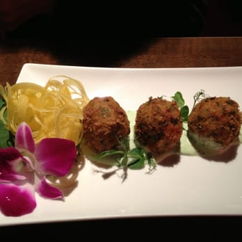 Nagasui - Delicious Crab cakes with vinaigrette mayo, a shiso leaf and an orchid - Thai Near Me - Zürich, ZH Nagasui - Delicious Crab cakes with vinaigrette mayo, a shiso leaf and an orchid - Thai Near Me - Zürich, ZH
