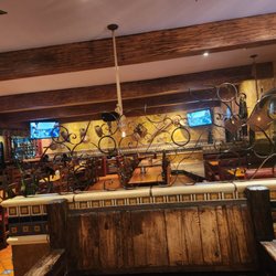 Inside of the restaurant -choice of table, booth, or bar seats