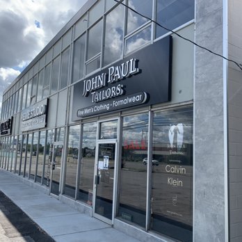 John Paul Tailors - New overhead signage to replace our old vintage awning sign. - Sewing & Alterations Near Me - Cheektowaga, New York