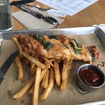 Industry - Fish and chips- looks delicious, but the fish was a grease ball - New American Near Me - San Marcos, Texas Industry - Fish and chips- looks delicious, but the fish was a grease ball - New American Near Me - San Marcos, Texas