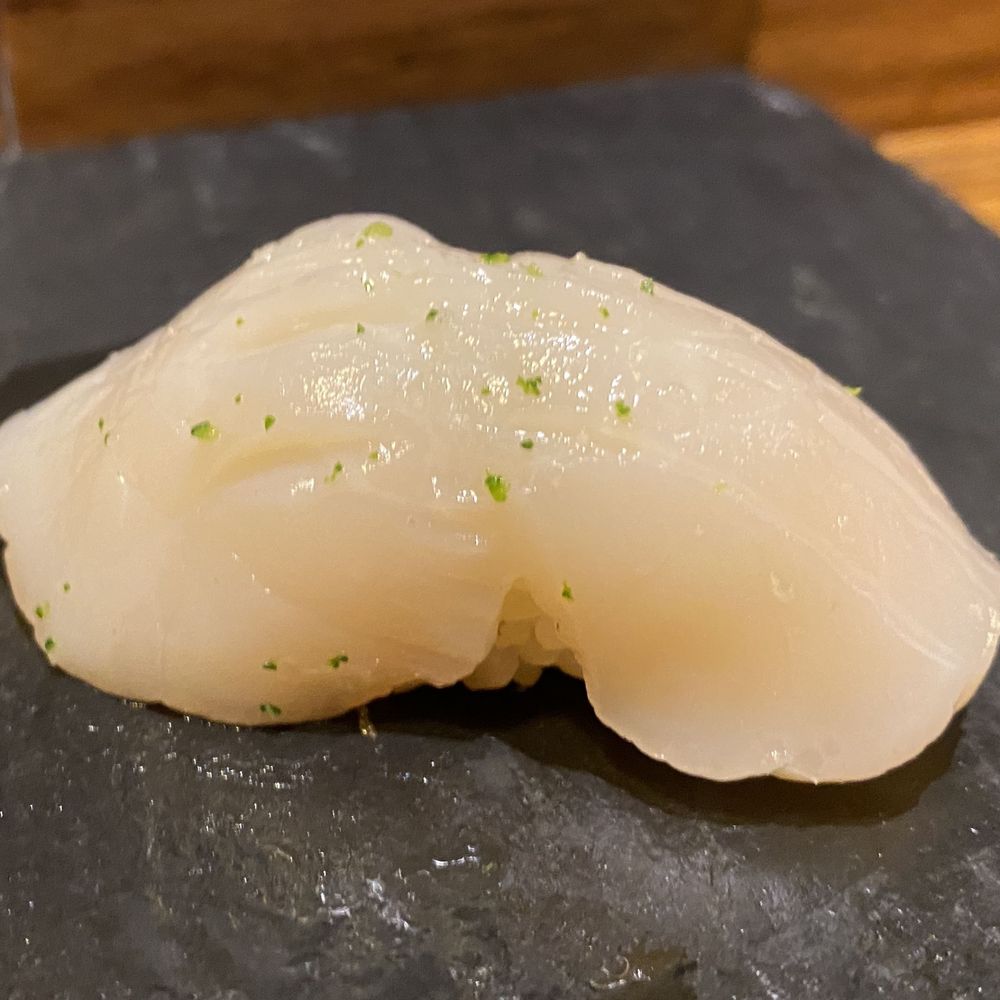 Sushi Lin Brooklyn - Hokkaido scallop w/yuzu zest, lemon and sea salt - Sushi Bars Near Me - Brooklyn, New York Sushi Lin Brooklyn - Hokkaido scallop w/yuzu zest, lemon and sea salt - Sushi Bars Near Me - Brooklyn, New York