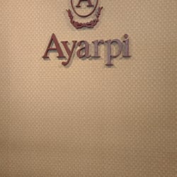 Ayarpi - El nombre y logo en la pared (?)