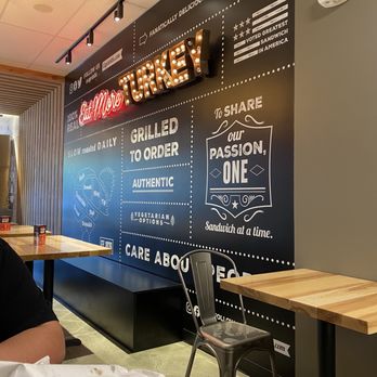 Capriotti's Sandwich Shop - Really cool looking wall, great rock music playing inside. - Sandwiches Near Me - Fresno, California