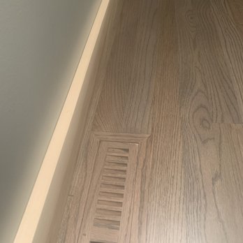 J.C.'s Hardwood Floors - Shows the crooked boards against the base board. - Flooring Near Me J.C.'s Hardwood Floors - Shows the crooked boards against the base board. - Flooring Near Me