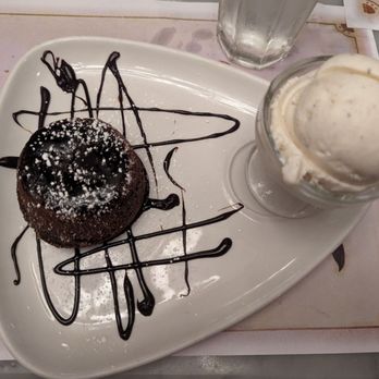 La P'tite Framboise - Chocolate lava cake with vanilla ice cream - French Near Me - Port Washington, New York La P'tite Framboise - Chocolate lava cake with vanilla ice cream - French Near Me - Port Washington, New York
