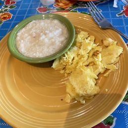 The scrambled eggs look fluffy and nicely cooked with a good golden color -- classic, comforting, and generous portion The scrambled eggs look fluffy and nicely cooked with a good golden color -- classic, comforting, and generous portion