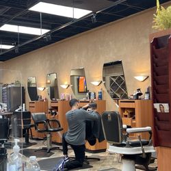Oscars Hair Salon - Alberto cutting my son's hair