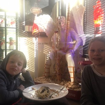 All Chocolate Kitchen - Chocolate Cupid sculpture. - Desserts Near Me - Geneva, Illinois
