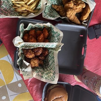 Wingstop - a variety of food items on a table - Chicken Wings Near Me - Southaven, Mississippi