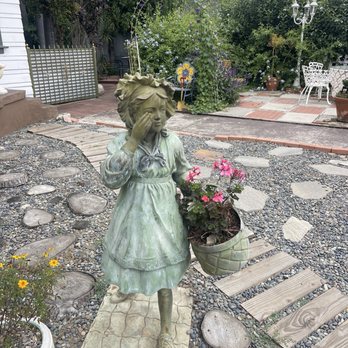 The Classic Cafe - One of the statues in the front it's super cute - Coffee & Tea Near Me - Fullerton, California