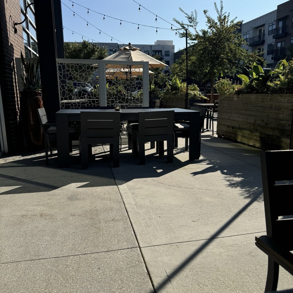 The Alden - Beautiful patio by the smoker. - New American Near Me - Chamblee, Georgia