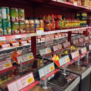 Bulk Barn - a woman shopping in a grocery store - Specialty Food Near Me - Victoria, British Columbia