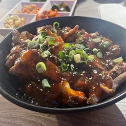Chicken Teriyaki Bowl (J11): bowl of chicken teriyaki over white rice Chicken Teriyaki Bowl (J11): bowl of chicken teriyaki over white rice