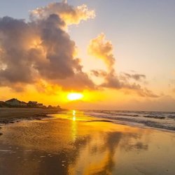 Blue Heaven Beach Cabin - The Crystal Beach sunrise in front of Blue Heaven