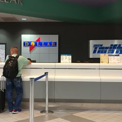 Dollar Rental Car - Dollar counter at LIT
