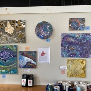 Cafe Strudel - a variety of paintings on a wall - Breakfast & Brunch Near Me - Lexington, South Carolina