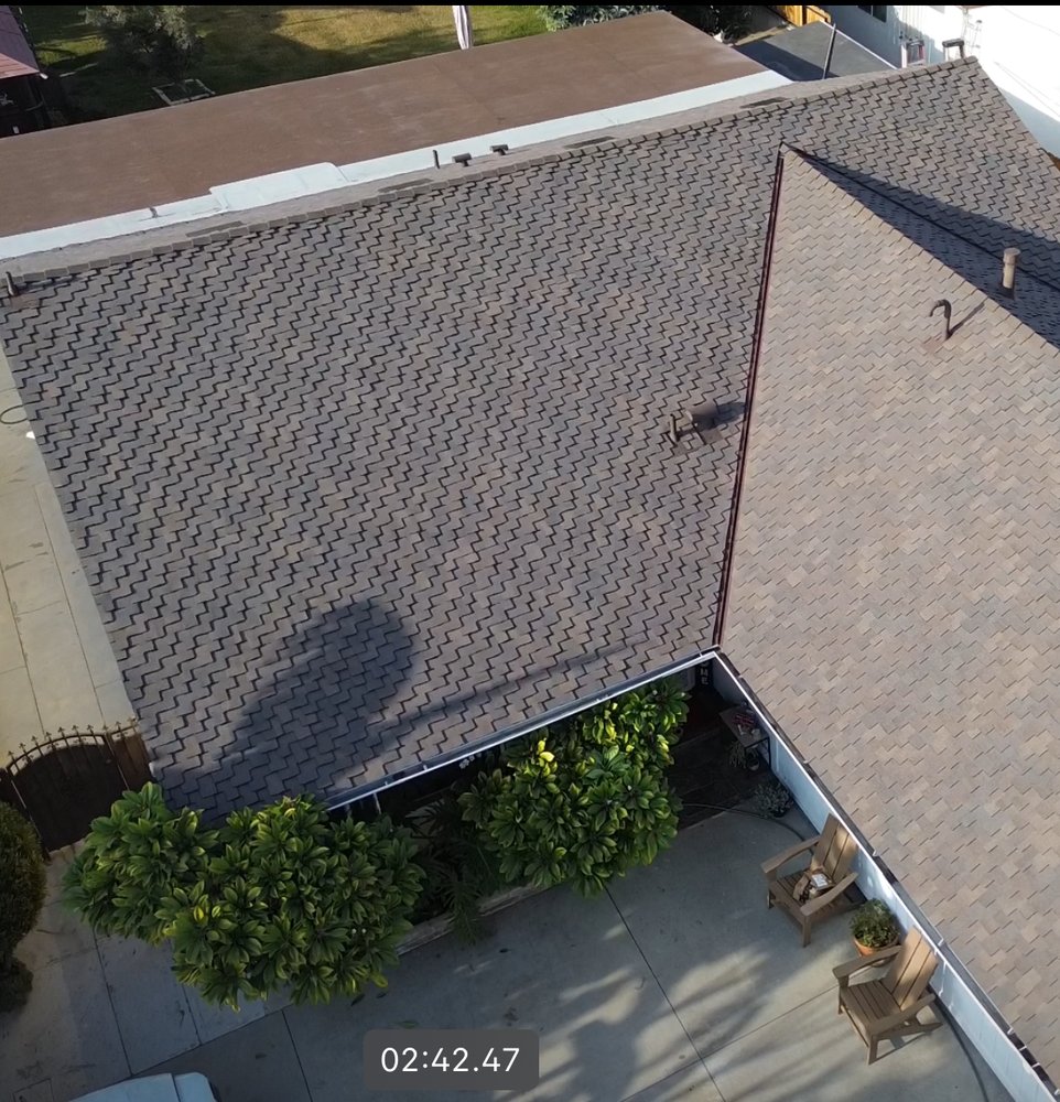 Slide of MC Elite Roofing