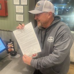 Signing AMF waiver.