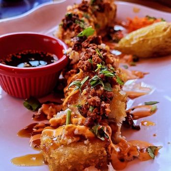 Sushinaloa - El Chorizon - Chorio, jalapeño, cream cheese and avocado (deep fried) - Sushi Bars Near Me - Redwood City, California Sushinaloa - El Chorizon - Chorio, jalapeño, cream cheese and avocado (deep fried) - Sushi Bars Near Me - Redwood City, California