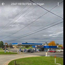 Mobile & One Stop Food Store - Cloudy day time pic of Mobile & One Stop Food Store.