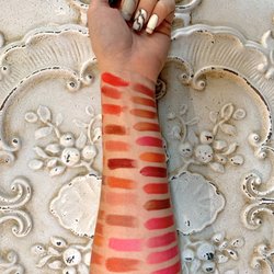 Midtown Salon - Swatching a few of our new lipstick colors. Full retail makeup products available in many different shades!